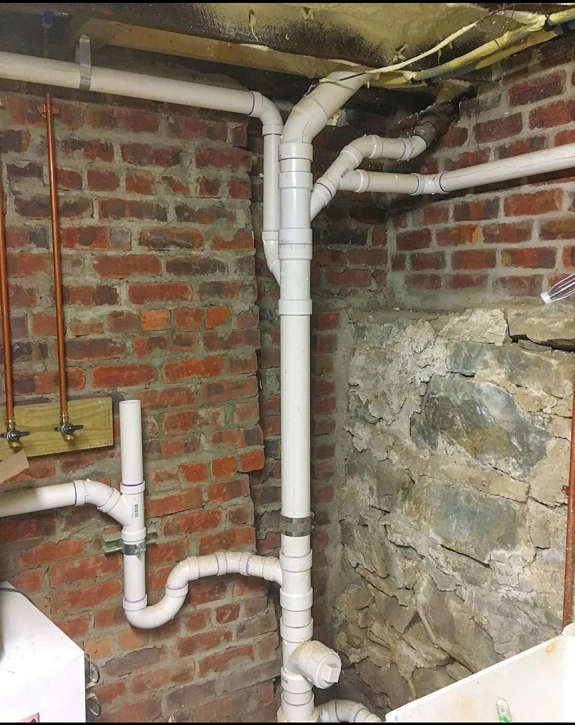Basement drain pipe installation by Vertex Services