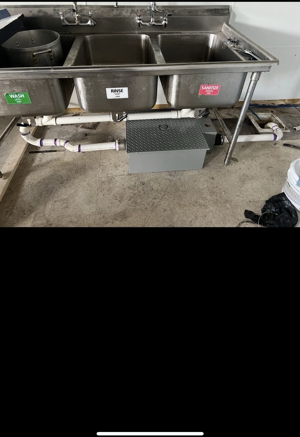 Commercial sink drain installation by Vertex Services