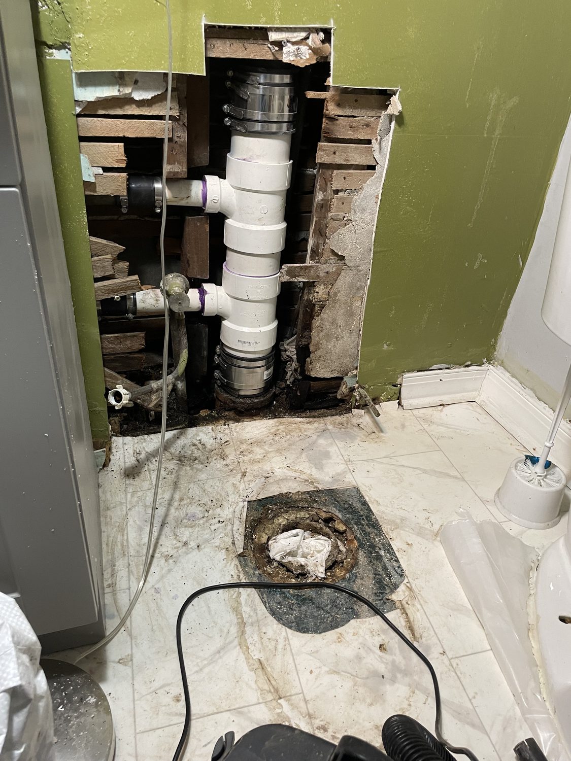 Wall access sewer repair by Vertex Services